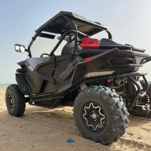 Buggy Easy Quad Saly vu de trois-quarts arrière sur une plage de la Petite Côte